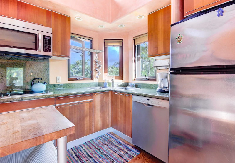 Kitchen with granite counters and European appliances