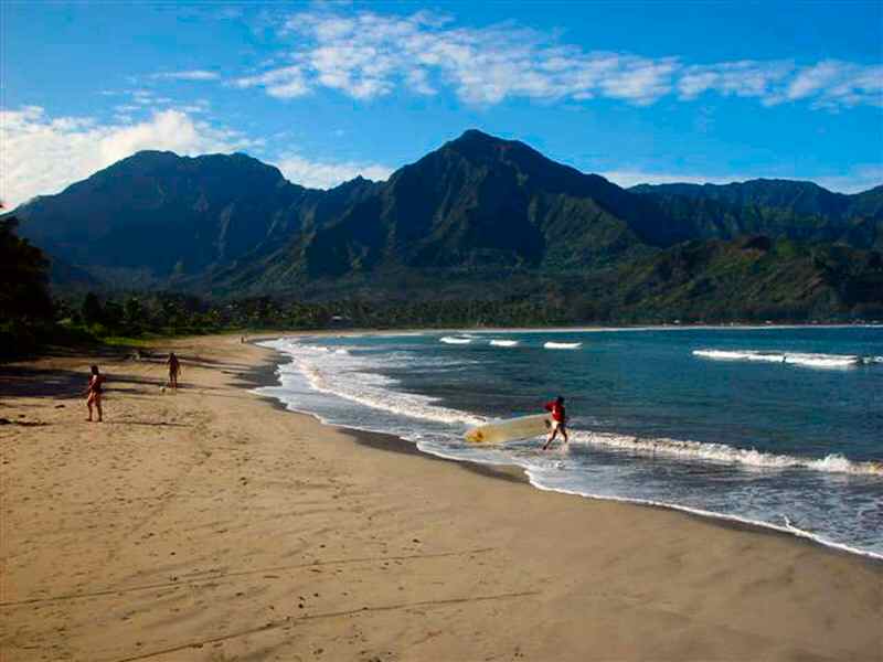 Hanalei Beach stretches in a long crescent for two miles