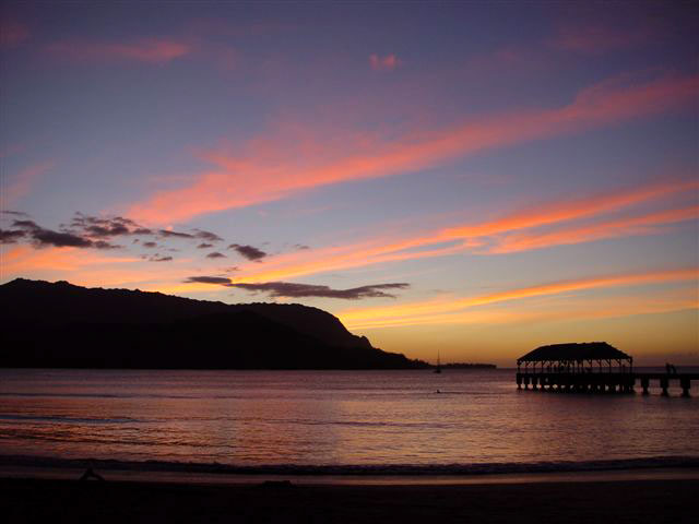 Sunset on the beach from directly in front of the property