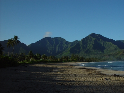 The crescent shaped beach of Hanalei Bay is nearly two miles long